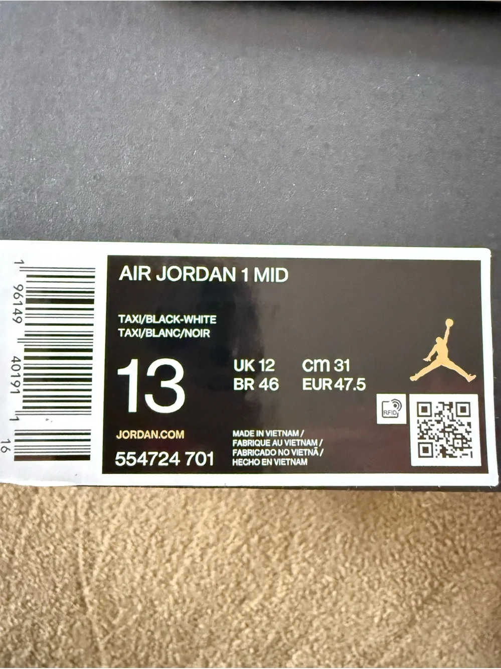 Jordan• 1 Mid in Taxi, Black, White